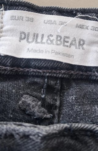 Bermudas hombre grises desgastadas