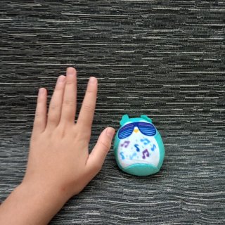 Peluche búho gafas música