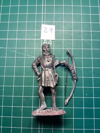 Figura de plomo arquero