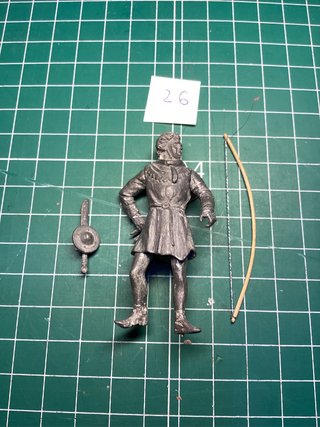 Figura de plomo arquero con arco