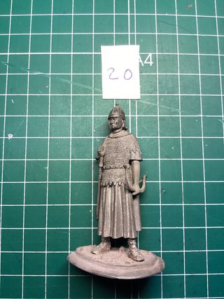 Figura de plomo guerrero con arco