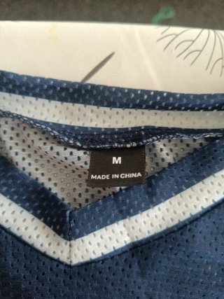Lote de dos camisetas estilo fútbol americano 91
