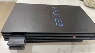Pacchetto PS2 Slim + Controller e Giochi