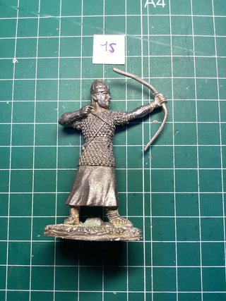Figura de plomo arquero
