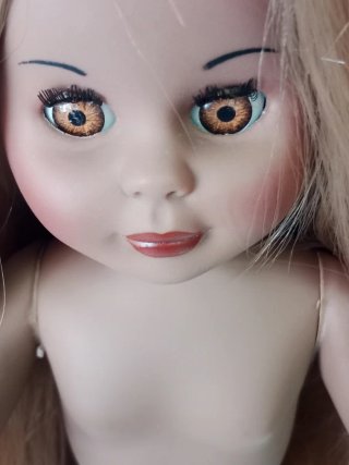 Muñeca pelo rubio ojos marrones,negra,copia nancyn