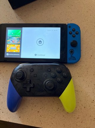 Nintendo Switch + Controller Pro + 3 Giochi
