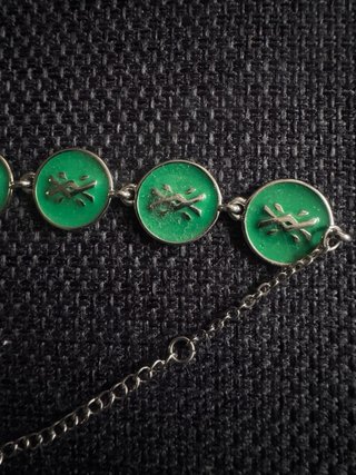 Pulsera Benetton esmaltada con logo