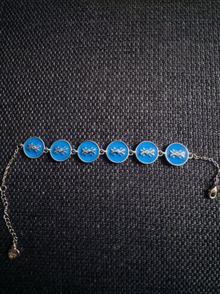 Pulsera Benetton azul con logo