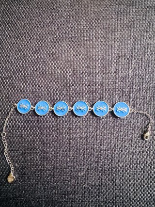 Pulsera Benetton azul con logo
