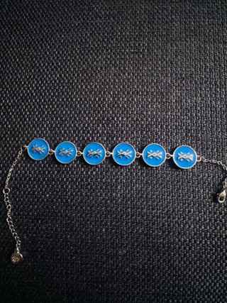Pulsera Benetton azul con logo