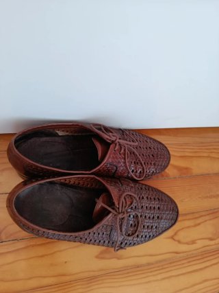 Scarpe eleganti in pelle intrecciata