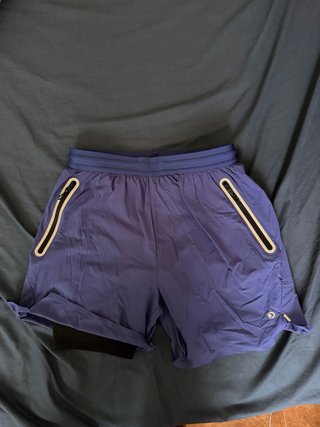 Pantalón corto deportivo azul para running