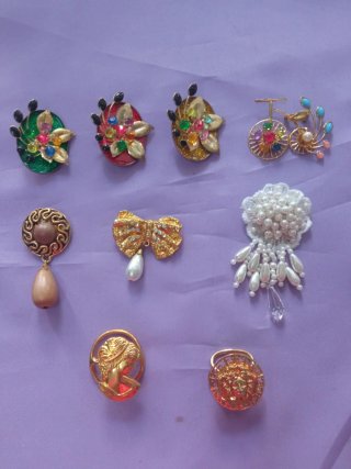 Broche per sciarpe e altri capi. Qualità.