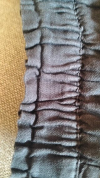 Falda Zara talla 11-12 gris oscuro con lazito.