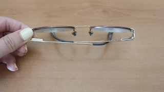 Montura de gafas redondas dorada y marrón