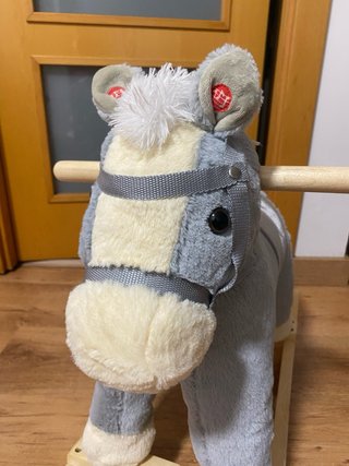 Caballito balancín gris peluche
