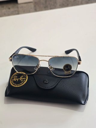 Gafas de sol Ray-Ban doradas y azules