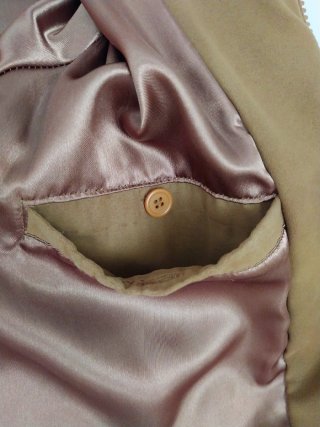 Abrigo acolchado símil piel ante con capucha