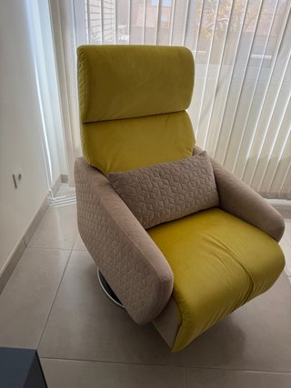 Sillón reclinable y giragiratode tela