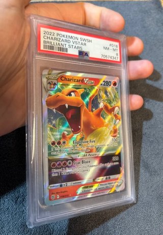Carta Pokémon Charizard VSTAR 018/172 PSA 8