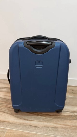 Maleta azul de viaje