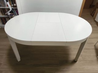 Mesa de comedor redonda de madera