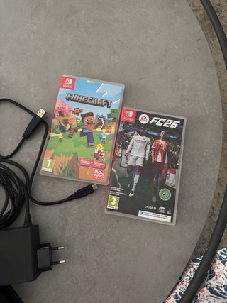 Nintendo Switch Azul/Rojo + Accesorios + 2 juegos.