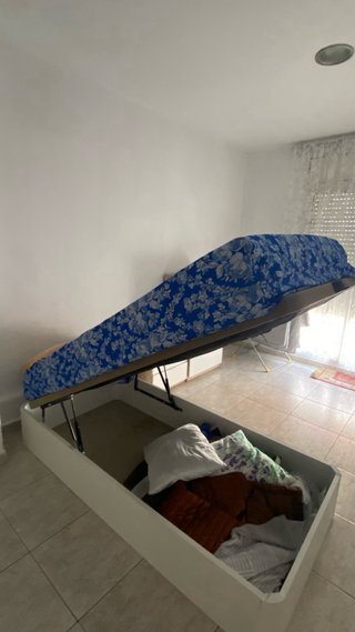 Armario corredero y cama canapé