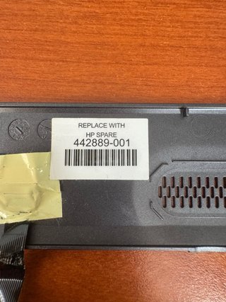 Compaq parte superior con botón de encendido