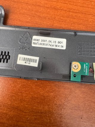Compaq parte superior con botón de encendido