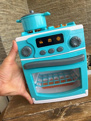 Cocinita de juguete azul con accesorios