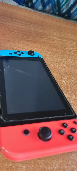 Nintendo Switch completa con caja