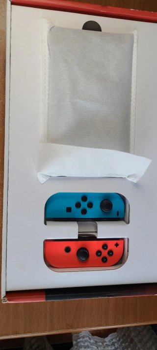 Nintendo Switch completa con caja