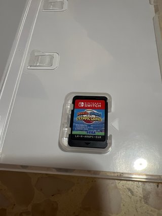 Nintendo Switch OLED + Videogioco + 2 Custodie