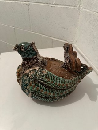 Figura pavo real terracota/barro