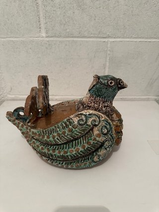 Figura pavo real terracota/barro