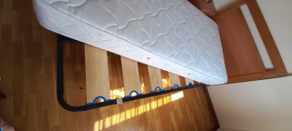 2,camas individuales madera con mesita noche