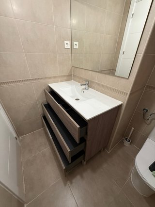 Mueble de baño madera y lavabo