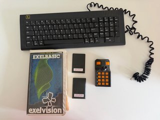 Teclado Exelvision EXL 100 + Accesorios