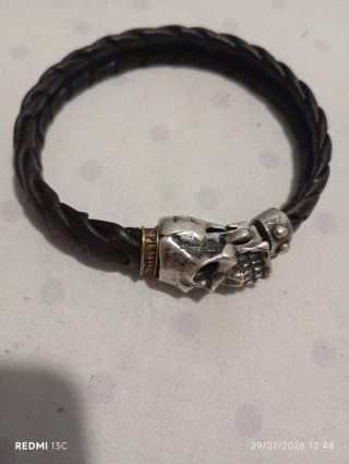 Pulsera cuero trenzado calavera plata