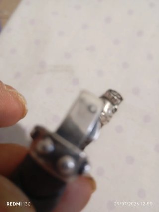 Pulsera cuero trenzado calavera plata