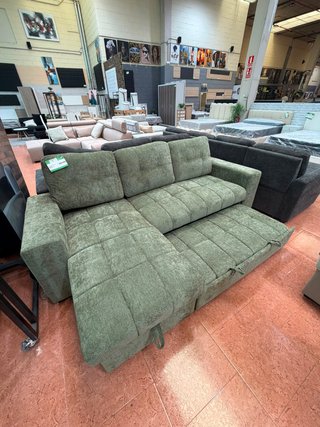 Sofá cama con arcón verde
