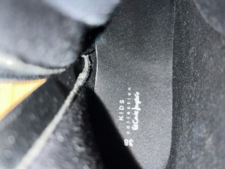 Botas de agua negras con purpurina