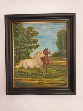 Cuadro de caballos con marco negro