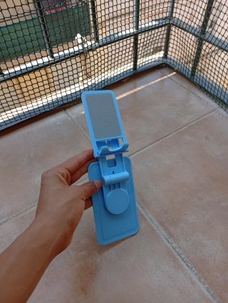Soporte para móvil azul plegable