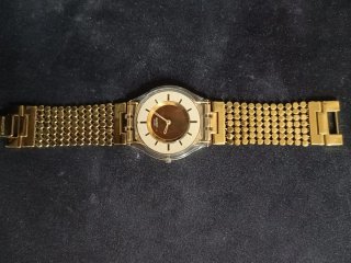 Reloj Swatch Dorado Mujer
