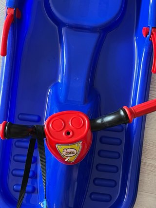 Trineo infantil azul con volante