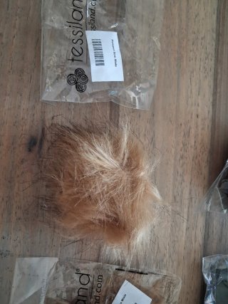 Pompon in pelliccia sintetica