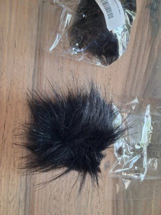 Pompon in pelliccia sintetica