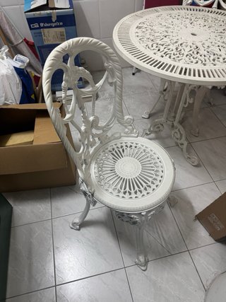Conjunto mesa silla terraza jardín
